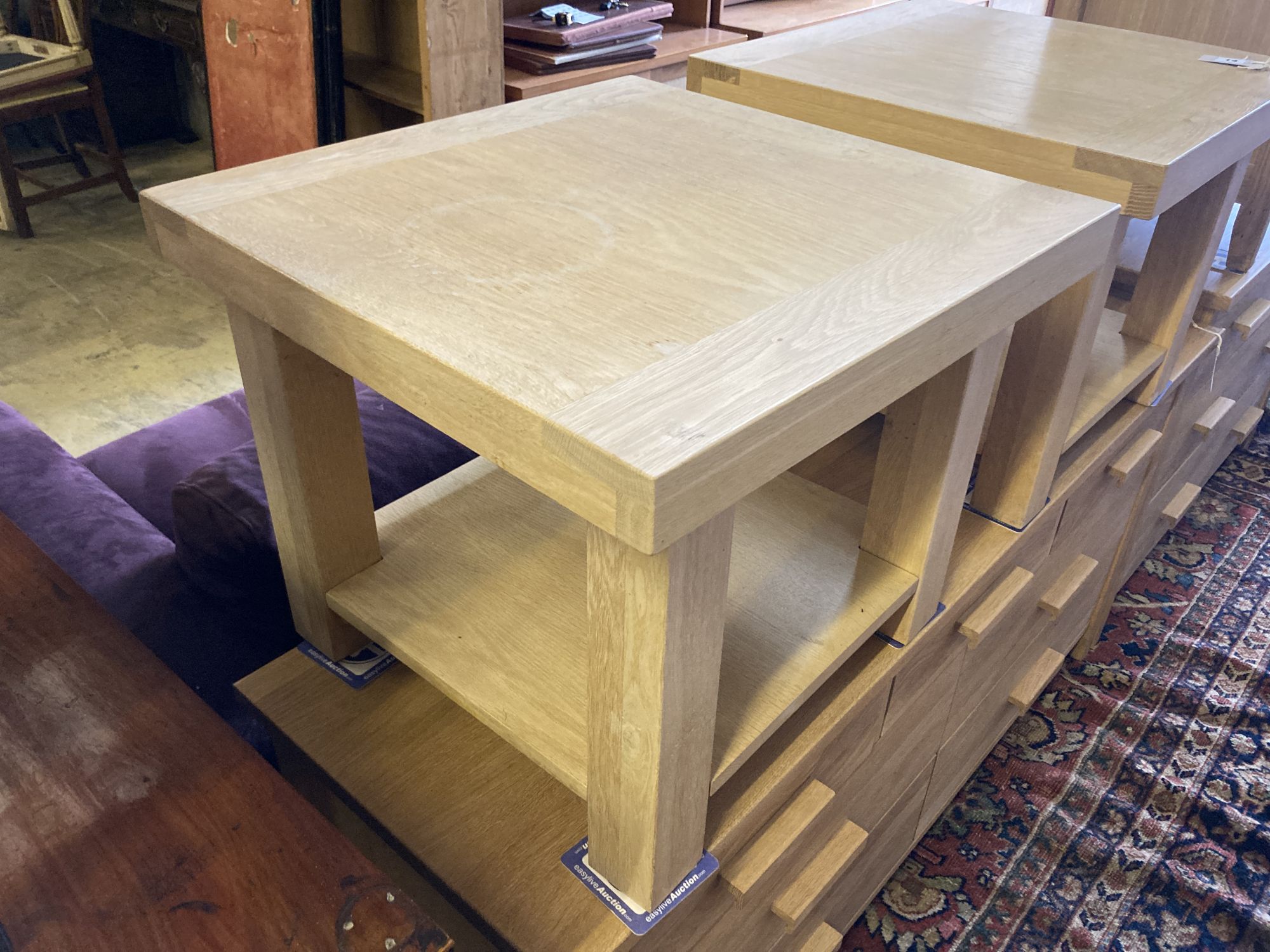 A pair of contemporary oak two-tier occasional tables, width 55cm, depth 55cm, height 45cm